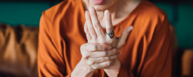 Person with arthritis pain in hand